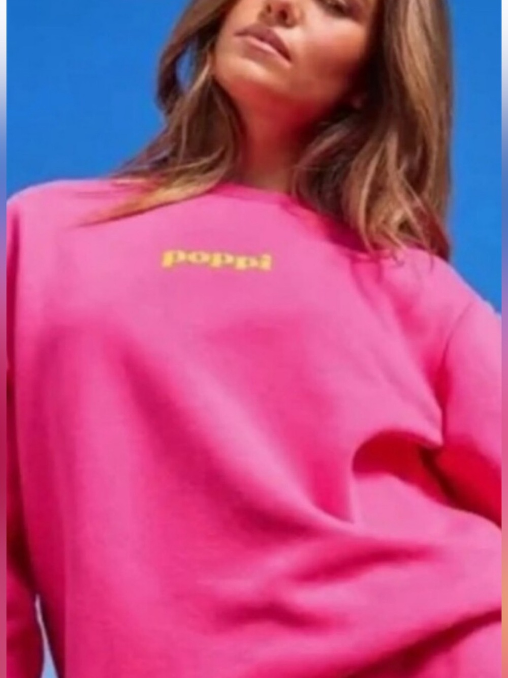 Poppi bright pink crewneck with yellow poppi logo